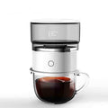 Compact portable drip coffee maker with stainless steel filter and battery power for travel and outdoor use