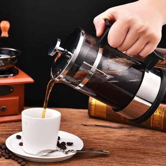 Elegant glass and stainless steel French Press with double-layer filtration and 350ml capacity brewing rich coffee