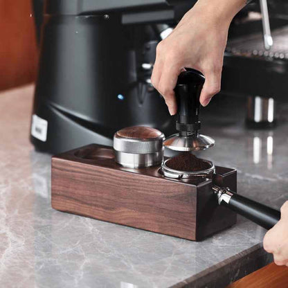 Solid wood barista station rack organizing tamper, portafilter, and coffee tools on kitchen counter