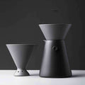 Handcrafted ceramic pour-over coffee set with minimalist design and drip-proof filter cup