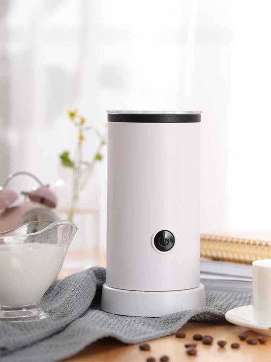 Automatic Electric Milk Frother with stainless steel build and one-touch operation on kitchen countertop