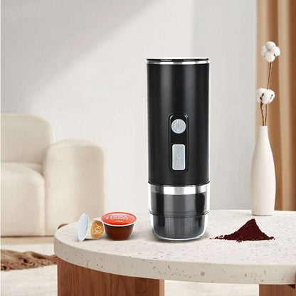 Compact portable espresso machine brewing espresso from capsules with water tank and electric pump pressure